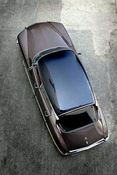 an overhead view of a car parked on the street