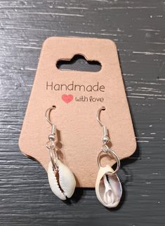 Handmade seashell earrings Nickel-free Shell Gift, Single Dangle Earring For Beach, Handmade Teardrop Earrings For Vacation, Handmade Adjustable Ocean-inspired Earrings, Beach Drop Clip-on Earrings, Silver Dangle Earrings For The Beach, White Pearl Earrings For The Beach, Handmade Drop Earrings For The Beach, Adjustable Shell Earrings With Ocean-inspired Style