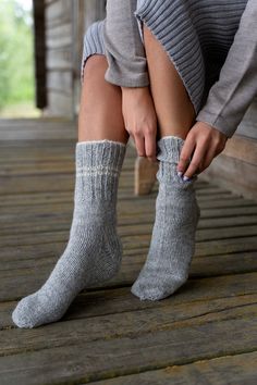 "Hand knitted socks is the winter's must have! Natural wool grants moisture absorption and warmth. Pure fabric is skin friendly and sustainable choice. Minimalist high quality boots socks will keep you toasty warm even being in the cold outside for hours. Breathable, so you do not worry about sweat, your feet will stay dry. These lightweight knit socks are made of natural sheep wool yarns. I need 1-3 business days to knit a pair of socks. Sizes EU / USA/CA ‣ XS 36-38 / 5.5 - 7.5 (22-23cm, 8-9\") Comfortable Knitted Gray Socks, Comfortable Knitted Winter Socks, Comfortable Hand Knitted Winter Socks, Snug Gray Winter Socks, Comfortable Thick Winter Socks, Hand Knitted Winter Socks, Boots Socks, Woolen Socks, Hygge Style