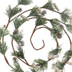 a christmas wreath made out of branches and pine cones