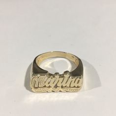 Beautiful 14k Yellow Gold Custom Made Marina Name Ring. Weight: 5.5g. Width: 10.5mm. New Without Tags. Size: 9.25. Gold Hoop Earrings Mexican, Personalized 14k Gold Rings Fine Jewelry, Personalized 14k Gold Fine Rings, Personalized Engraved 14k Gold Ring, 14k Gold Signet Ring With Diamond Cut, Yellow Gold Engraved Ring With Hallmarks, Engraved Yellow Gold Ring With Hallmarks, Engraved 14k Yellow Gold Rings, Hallmarked Yellow Gold Nameplate Jewelry