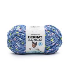 bernat baby blue and green yarn with multicolored dots on the top,