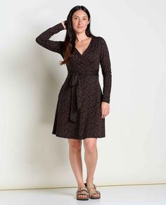 Dress up or down, no comfort sacrificed. A faux wrap is cute as can be but will stay secure, and a self-tie adds a bonus dose of pizzazz. Black Wrap Dress With Surplice Neckline For Fall, Black Wrap Dress For Fall, Long Sleeve Dress Black, Tencel Dress, Resale Shops, Black Long Sleeve Dress, Black Dots, Sweater And Shorts, Toad