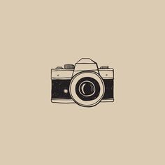 a camera on a beige background