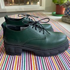 Never Been Worn! These Shoes Look *So Rad*. I Wanted So Badly For Them To Fit But They Were Just A Wee Bit Too Bit - I’m Usually A 8.5. Size 40 - 7.5 Men’s 9 Women’s Description From Ssense: Handcrafted Buffed Appleskin Faux-Leather Derbys In Green. Text Embossed At Outer Side. Lace-Up Closure Pull-Loop At Heel Counter Logo-Embossed Heel Treaded Recycled Rubber Sole Platform: H1.5 In Heel: H2 In Available Exclusively At Ssense. Supplier Color: Forest Apple Upper: Synthetic. Sole: Rubber. Made In Recycled Rubber, Derby, Rubber Sole, Faux Leather, Forest, Lace Up, Women Shoes, Heels, Lace