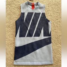 Nike Mesh Tank Size Small Brand New With Tags Blue Crew Neck Tank Top For Streetwear, Blue Tank Top For Spring Streetwear, Spring Blue Tank Top For Streetwear, Summer Blue Streetwear Tank Top, Blue Tank Top For Summer Streetwear, Blue Sports Tank Top With Graphic Print, Nike Sleeveless Tops For Streetwear, Nike Sleeveless Streetwear Tops, Blue Graphic Tank Top For Sports