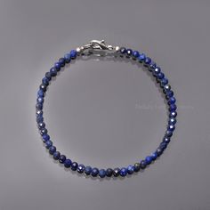 "Product Details :  Item : Lapis Lazuli Beaded Necklace Item Code : DGC4446 Gemstone Name :  Lapis Lazuli Chain Style : Beaded Beads Shape : Faceted Round Beads Size : 3.5 mm Approx. Length : 8\" Inch Approx. Weight : 18 Cts. Approx. Customization : **Available** Please Feel Free To Contact If You Have Any Query." Sapphire Lapis Lazuli Bracelets With Round Beads, Adjustable Faceted Sapphire Bracelets, Adjustable Faceted Sapphire Bracelet, Adjustable Lapis Lazuli Beaded Bracelet With Faceted Beads, Sapphire Round Faceted Bead Bracelets, Blue Faceted Beaded Bracelets, Lapis Lazuli Beaded Bracelets With Polished Round Beads, Polished Beads Lapis Lazuli Round Bracelets, Polished Beads Lapis Lazuli Bracelets