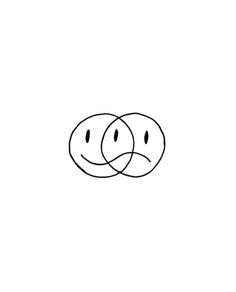 two smiley faces drawn in black and white