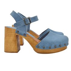 Supported by a practical heel, solid and incredibly comfortable, our Dutch-style sandals are sure to stand out and are easy to combine with all kinds of looks. Clogs with light brown wood effect base Sky blue leather upper Soft leather insole Adjustable ankle strap Heel height 8.5 cm with 3.5 cm plateau Comfortable and elegant Made entirely by specialized Italian personnel Handcrafted products using the best materials. BEFORE PURCHASING DO NOT FORGET TO CHECK THE SIZE! Dutch Style, Blue Heels, Ankle Strap Heels, Blue Leather, Women's Shoes Sandals, Light Brown, Soft Leather, Blue Sky, Ankle Strap