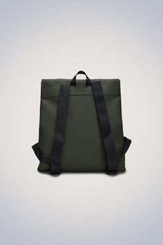 MSN Bag reinterprets the classic school backpack for city-ready wardrobes. Characterized by a minimalistic silhouette and flap with carabiner closure. This bag features an internal laptop pocket, a spacious main compartment and finished off with snap compressions at opening and sides. The laptop pocket fits a 13" laptop with sleeve, making the MSN Bag a perfect computer-ready staple for everyday commutes. MSN Bag is cut from Rains' signature PU fabric, engineered for carrying strength, durabilit Modern Flap Backpack For Everyday Use, Modern Backpack With Detachable Strap And Flap, Green Commuting Backpack With Adjustable Strap, Classic Green Backpack For Everyday, Green Laptop Bag For Commuting, Classic Green Standard Backpack, Modern Green Standard Backpack, Functional Satchel With Adjustable Strap And Backpack Shape, Green Commuting Bag With Adjustable Strap