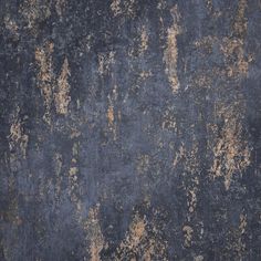 an old, dirty surface with brown and black paint