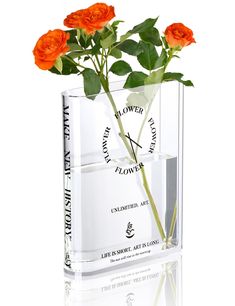 three orange roses in a clear vase on a white background with the words flower power written across it