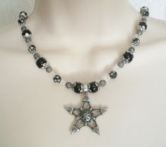 "This beautiful necklace has black pearl beads, black beads with silver engraved stars, seed beads, sterling silver plated filigree beads, pewter silver bead caps and a pewter silver pentagram. 18\" long. Sterling silver plated toggle clasp." Wicca Jewelry, Pagan Necklace, Wiccan Necklace, Pentagram Necklace, Goddess Jewelry, Wiccan Jewelry, Wicca Witchcraft, Witch Jewelry, Pagan Jewelry