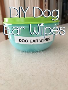 a dog bowl with the words diy dog ear wipes on it sitting on a counter