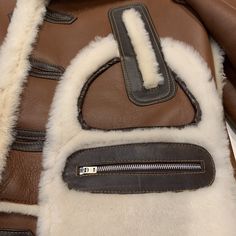 Daniels Leather Chocolate 3/4 Shearling Jacket - Dudes Boutique Designer Shearling Leather Jacket With Padded Collar, Luxury Shearling Outerwear With Padded Collar, Luxury Brown Fur Coat, Luxury Brown Long Coat, Luxury Shearling Leather Jacket With Faux Fur Lining, Designer Sheepskin Leather Jacket For Fall, Brown Luxury Long-sleeve Fur Coat, Luxury Sheepskin Leather Jacket With Faux Fur Lining, Brown Sheepskin Leather Jacket With Faux Fur Lining