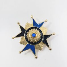 "Hand enameled brass Maltese Cross has beautiful vintage cabochon in center.  100% hand assembled by Spectra Nova Measures: 2.25\" x 2.25\" or 54mm x 54mm" Antique Blue Enamel Brooches, Antique Handmade Blue Brooches, Antique Blue Collectible Brooches, Collectible Blue Enamel Pin, Blue Enamel Collectible Pin, Vintage Blue Ceremonial Jewelry, Vintage Blue Enamel Pin Gift, Red Patch, Pocket Watch Chain