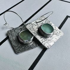 Beautiful sea glass on hand hammered sterling silver with silver plated hoop.  All handmade from scratch local here in Kansas City by ME🥰. I love making beautiful wearable art for all to enjoy a very long time! Cant wait to see them on you! Handmade Silver Sea Glass Earrings, Handmade Silver Earrings With Sea Glass, Nickel-free Silver Earrings With Recycled Glass, Nickel-free Silver Earrings In Recycled Glass, Silver Sea, Hammered Sterling Silver, Beautiful Sea, Lightweight Earrings, Earrings Statement