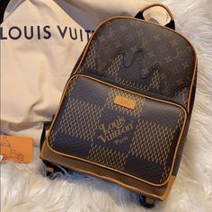 Head Turning Piece!! Gorgeous, Rare Louis Vuitton 2 Campus Backpack From The Nigo Collection. Very Few Made And Completely Sold Out!! Perfect Size For Daily Use Or Travel. Not In Hurry To Sell!! No Lowball Offers!! *Listing For Backpack & Tags Only* Luxury Coated Canvas Backpack, Luxury Monogram Canvas Backpack, Designer Travel Bag In Signature Coated Canvas, Designer Signature Coated Canvas Travel Bags, Designer Monogram Canvas Backpack For Travel, Designer Brown Coated Canvas Backpack, Brown Monogram Canvas Rectangular Backpack, Luxury Brown Monogram Canvas Backpack, Luxury Brown Backpack