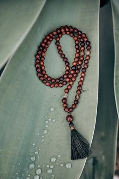 Spiritual jewelry, mala, jewelry, necklaces, 108 beads, mantra mala, chakra healing, tassel necklace, gift for him, calm the mind, hand made mala, yoga mala beads. ----- FREE SHIPPING -------  This listing is for one mala necklace. This healing mala necklace features 108 beads (8mm) of Smoked Quartz + Agate + Wooden beads. Whether as a calming meditation guide or a beautiful, neutral, and natural statement piece, this necklace will be a great addition to your spiritual practice. GEMSTONE PROPERT Brown Spiritual Beads For Meditation, Spiritual Wooden Beads Jewelry For Meditation, Holistic Healing Mala With Wooden Beads, Artisan 108 Beads For Meditation, Artisan Wooden Beads For Meditation, Artisan Wooden Meditation Beads, Spiritual Healing Brown Beads, Artisan Mala With Round Beads For Meditation, 8mm Spiritual Beads For Meditation