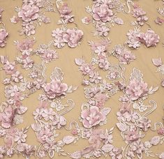 pink flowers and leaves on beige fabric