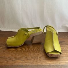 Beautiful Chartreuse Leather Clogs. 3” Wooden Block Heel With Added Rubber Traction. Never Worn Outside! Basically Brand New. Summer Slip-on Clogs With Sculpted Heel, Green Mules With Leather Sole For Spring, Green Leather Sole Mules For Spring, Spring Green Mules With Leather Sole, Green Open Toe Mules With Leather Sole, Spring Open Toe Clogs With Stacked Heel, Spring Green Mules With Sculpted Heel, Green Round Toe Platform Mules, Green Heels With Leather Sole And Round Toe