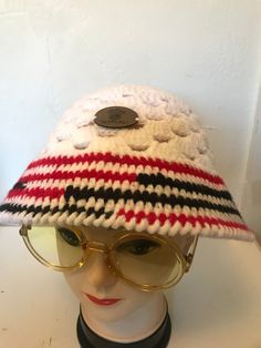 Hand made with 100% Acrylic yarn Adult Hat (S/M) Retro Winter Hat One Size, Retro Brimmed Bucket Hat For Winter, Retro Brimmed Winter Bucket Hat, Winter Retro Brimmed Bucket Hat, Retro Beanie Hat One Size, One Size Brimmed Winter Sun Hat, Red Vintage Hat For Vacation, Vintage Red Hat For Vacation, Retro White Wide Brim Sun Hat