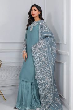 Women's party wear designer pure chiffon suit in light blue color. Fully Stitched with lining 3 piece Orignal Pakistani Designer Suit - same product as show in the picture. Ready to ship from California Product Info:Includes: Shirt, Trouser And Dupatta With AccessoriesColor: Blue ColorMaterial: Pure Chiffon Work: Embroidered Chiffon Front, Plain Chiffon Back, Plain TrousersSleeves: Embroidered Chiffon SleevesBottom: Dyed Silk TrousersDupatta: Embroidered Cotton Pati Organza 2.60 YardFit: True to Chiffon Sharara, Light Blue Party, Long Kameez, Lucknowi Kurta, Chiffon Suit, Bridal Dupatta, Pakistani Party Wear, Shirt Trouser, Pakistani Designer Suits