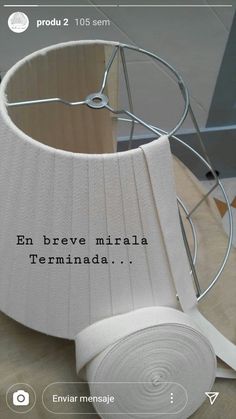 a lamp shade with the words en brevee mirala tennada on it