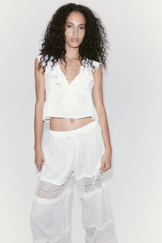 Lace-inset Crêpe Pants - Regular waist - Long - Cream - Ladies | H&M US Chic Lace Trim Bottoms For Spring, Chic Spring Bottoms With Lace Trim, Cropped Summer Bottoms For Daywear, Viscose Summer Pants For Daywear, Summer Viscose Daywear Pants, Summer Daywear Viscose Pants, Chic Lace-trim Loungewear Bottoms, Chic Lace Trim Loungewear Bottoms, Chic Lace Trim Bottoms For Loungewear