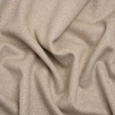 Master the art of looking good despite the cold with this Beige and Cream Herringbone Brushed Wool Blend Twill Coating, displaying a beige and cream herringbone pattern across its fuzzy, slightly tactile face and reverse. It features a subtle luster and a malleable drape. A lining will increase warmth and structure but is not necessary.

An easy way to elevate your look while staying warm, high-quality wool outerwear brings a chic maturity to your street, corporate, or formal style. The impact of a wool coat—be it oversized, fitted, wrap-around, or trench—is timeless, promoting practical fashion through a heavyweight feel. Though the wind is sharp, you’ll suddenly find yourself eager to walk the cold city streets in your new winter staple... (thank you, Mood!) Mood Designer Fabrics, Twill Coat, Practical Fashion, Mood Fabrics, Stripe Silk, Formal Style, Herringbone Pattern, Silk Twill, Looking Good