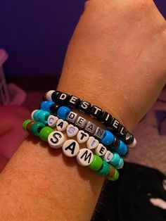 Custom personalized Supernatural bracelets, made to order, just for you! Any character, any ship, any quote, any anything Supernatural related! Your arm will look beautiful in our amazing custom patterned kandi bracelets <3 We offer all colors of the rainbow, plus a few extra shades, and various specialty beads. If you have something specific in mind, please message us beforehand to see if it's possible! Please refer to the last photo to see an example of our variety :D Check out our shop for Personalized Themed Bracelets With Round Beads, Themed Personalized Round Bead Bracelets, Customizable Green Bracelet For Personalized Gift, Customizable Adjustable Themed Beaded Bracelets, Customizable Themed Beaded Bracelets, Personalized Themed Beaded Bracelets As Gifts, Personalized Themed Beaded Bracelets For Gifts, Themed Personalized Beaded Bracelets For Gifts, Customized Friendship Wristband For Novelty