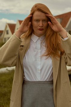 This classically tailored shirt is the epitome of an essential basic. It is slightly shaped through the waist, with a fitted shoulder and GRAMMAR signature mitered corners on the cuffs and collar stand. Looks great tucked and untucked. Photography from our Amsterdam lookbook shot by Lily Cummings and modeled by Marte Boneschansker. Classic Spring Shirt For Work, Lapel Collar Shirt For Daywear In Fall, Timeless Spread Collar Blouse For Work, Timeless Relaxed Fit Workwear Shirt, Timeless Relaxed Fit Shirt For Work, Timeless Blouse With Fold Down Collar For Work, Timeless Dress Shirt With Concealed Placket For Work, Timeless Dress Shirt With Hidden Button For Work, Timeless Dress Shirt With Hidden Button Closure For Work