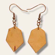 Hexagon birch bark earrings come in various designs and styles. The versatility of these designs allows wearers to choose the style that best suits their personal taste and fashion preferences. Hexagon birch bark earrings offer a captivating fusion of nature's beauty and geometric elegance. With their distinctive shapes, natural texture, and earthy hues, these earrings serve as an exquisite reminder of the harmony found in the natural world, making them an excellent choice for individuals seekin Birch Bark Earrings Diy, Brown Geometric Earrings As Gift, Natural Wood Jewelry With Variations, Handmade Hexagon Jewelry, Nickel-free Hexagon Earrings As A Gift, Brown Geometric Earrings Gift, Birch Bark Earrings, Nickel-free Hexagon Earrings For Gift, Nature-inspired Natural Wood Jewelry With Variations