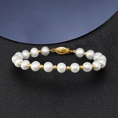 Ross-Simons - 6-7mm Cultured Pearl Bracelet with 14kt Yellow Gold. 8". Our gorgeous 6-7mm cultured freshwater pearl and 14kt yellow gold bead bracelet will add a classic touch of elegance to your look! Fishhook clasp, white pearl bracelet. Pearl birthstones are the perfect gift for June birthdays. Elegant Hand-strung Rondelle Pearl Bracelet, Elegant Gold Bracelet With Hypoallergenic Round Beads, Classic Yellow Gold Pearl Beaded Bracelets, Elegant Hypoallergenic Gold Bracelet With Round Beads, Hypoallergenic Pearl Bracelet With Round Beads For Anniversary, Classic Rondelle Beaded Bracelets For Formal Occasions, Anniversary Yellow Gold Pearl Bracelet With Round Beads, Anniversary Yellow Gold Pearl Bracelet, Classic Gold Bracelet With Single Strand Round Beads