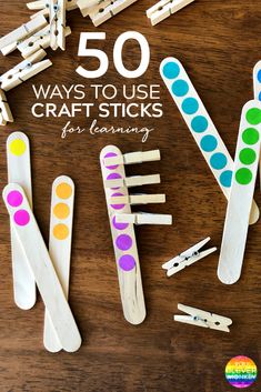 wooden pegs with different colored dots and the words 50 ways to use craft sticks for learning