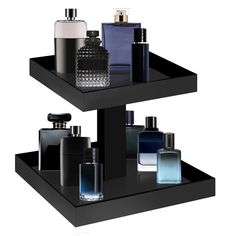 three tiered black shelf with different types of perfumes on it and one in the middle