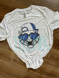 This is a sublimation design on white, bleached, and dyed items. Sublimation dyes the fabric and can have a vintage look when pressed. White does not show with sublimation-- the color of the shirt shows through the white areas of any design. All items are unisex. Default brands: Tees- Bella Long sleeve- Bella Baseball Tee- Next Level Crewnecks-Gildan/Hanes/Jerzees Bleached- Gildan Brands may be substituted if inventory is out. Design is approximately 12" so the larger the garment the smaller the Tie Dye Crewneck Sweatshirts, White Crewneck Sweatshirt, Cool Kid, Grey Tie Dye, White Crewneck, Grey Tie, Screen Printing Designs, Grey Tee, Toddler Tees