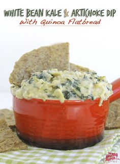 white bean kale artichoke dip with guacamole and pita chips