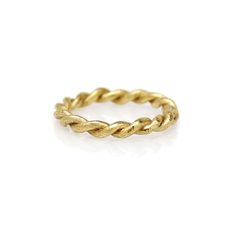 This ring features a classic twist motif with my delicate signature texturing. Because each twist is individually crafted by hand, each ring will have different markings and textures making each unique. Wear alone, or add to your stack. Materials: Solid 18K Gold Process: Casting Size: Custom made in the size you select Ready to ship in size 7 | Ships in 3-5 days. Custom sizes made to order. Please allow 1-2 weeks for production. Pretty Packages for Pretty Things Each piece ships in my custom pac Modern Twist Yellow Gold Stackable Rings With Round Band, Modern Twist Yellow Gold Stackable Rings, Yellow Gold Stackable Rings With Modern Twist, Modern Twist Twisted Promise Ring, Modern Twisted Shape Promise Ring, Modern Twisted Promise Ring, Twisted Stackable Promise Rings, Modern Twist Stackable Toe Rings, Modern Twist Yellow Gold Midi Rings For Anniversary