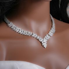 "Very romantic crystal bridal necklace, bracelet and earrings. Gorgeous diamond necklace set for your wedding day! Necklace measures 18\" long with an extension up to 21\". Earrings are about 1 1/2\" long and 1/2\"wide. Matching bracelet is measuring: 7\" long with an extension up 8 1/2\".  High quality guaranteed by GlamourBrideUSA! SHIPPING: Standard Shipping: 4-6 business days Priority mail Shipping: 2-3 business days *INTERNATIONAL ORDERS: PLEASE NOTE CUSTOMERS ARE RESPONSIBLE FOR ALL DUTIES Diamond Wedding Necklace, Diamond Necklace Set Bridal, Necklace Diamond, Diamond Set, Wedding Necklaces For Bride, Wedding Jewellery, Wedding Jewelry Ideas For Bride, Crystal Bridal Jewelry Sets, Crystal Wedding Necklace