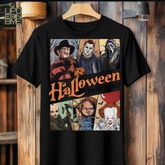 Fall Pop Culture T-shirt With Character Print, Funny Halloween T-shirt With Character Print, Halloween Themed Short Sleeve Shirt, Themed Halloween Short Sleeve Shirt, Pre-shrunk Themed Tops For Halloween, Halloween Pop Culture Cotton Shirt, Halloween Crew Neck Tops For Fan Conventions, Black T-shirt For Halloween And Fan Conventions, Fall Season Pop Culture T-shirt With Character Print