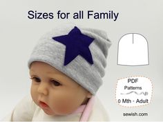 the baby is wearing a hat with a star on it