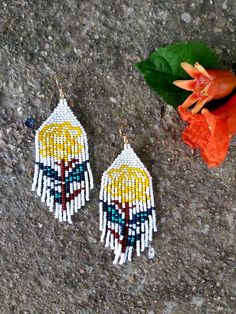 Southwestern Beaded Fringe Dangle Earrings, Southwestern Style Beaded Fringe Dangle Earrings, Southwestern Fringe Earrings With Round Beads, Southwestern Fringe Jewelry With Round Beads, Traditional Fringe Dangle Jewelry, Bohemian Chandelier Earrings With Beaded Fringe, Traditional Fringe Drop Earrings, Artisan Beaded Fringe Drop Earrings, Southwestern Beaded Fringe Dangle Jewelry