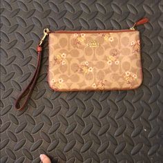 Wristlet, Two Tone Leather With Pink Flower Print. Never Used. Coach Wristlet Pouch For Daily Use, Coach Handheld Wristlet For Daily Use, Daily Use Coach Wristlet Pouch, Daily Use Coach Pouch Wristlet, Coach Wristlet With Removable Pouch For Daily Use, Coach Handheld Wristlet With Removable Pouch, Spring Coach Wristlet For Everyday Use, Coach Spring Wristlet For Everyday, Pink Flower Print