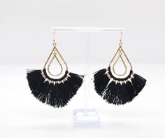 Black Teardrop Tassel Earrings are elegant and contemporary pieces of jewelry, featuring a sleek teardrop design with cascading tassels. They exude sophistication and style, with the black color providing a versatile and dramatic look suitable for various occasions. Elegant Black Fringe Chandelier Earrings, Elegant Black Long Drop Chandelier Earrings, Black Dangle Tassel Jewelry, Black Dangle Jewelry With Tassels, Black Fringe Tassel Drop Earrings, Black Tassel Party Jewelry, Black Tassel Jewelry For Party, Black Dangle Tassel Earrings For Party, Chic Black Fringe Earrings