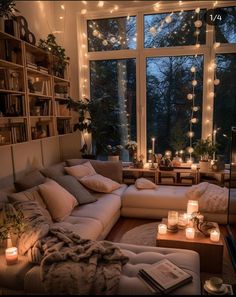 a living room filled with lots of furniture and candles