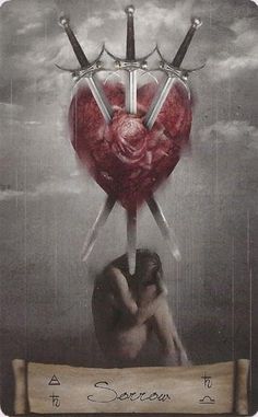 a heart with two swords sticking out of it