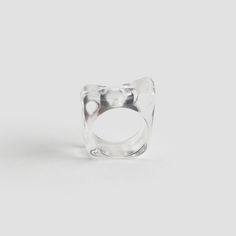 Step up your style game with our Clear Abstract Resin Ring—a modern piece with an effortlessly cool, transparent resin design. This one size ring fits like a size 7 and is as comfortable as it is bold, adding edge to any look. Crafted from high-quality resin, it’s hypoallergenic and tarnish-resistant, ensuring it stays vibrant and true to color even with sensitive skin. If you’re looking for a statement piece that combines quality and unique style, this Clear Resin Ring is your go-to accessory. Resin Rings, Transparent Resin, Resin Design, Resin Ring, Ring Fit, Clear Resin, To Color, Step Up, Unique Vintage