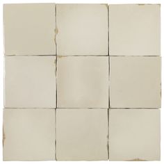 several white square tiles are arranged together