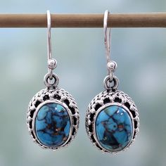 These sterling silver dangle earrings are presented by Indian artisan Shanker. Featuring stones of blue composite turquoise, this handcrafted pair hangs from silver hooks. Knot Earrings, Blue Hand, Silver Dangle Earrings, Sterling Silver Dangle Earrings, Silver Earrings Dangle, Hook Earrings, Sterling Silver Earrings, Jewelry Earrings Dangle, Silver Earrings